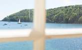 In one direction the green of the wooded headland creates a wonderful contrast against the crystal clear waters. - Thumbnail Image