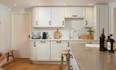 The kitchen/dining-room is sure to become the heart of the home during your stay at Island Cottage. - Thumbnail Image