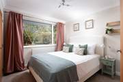 Pretty bedroom 3 sits at the back of Great Meadow Retreat