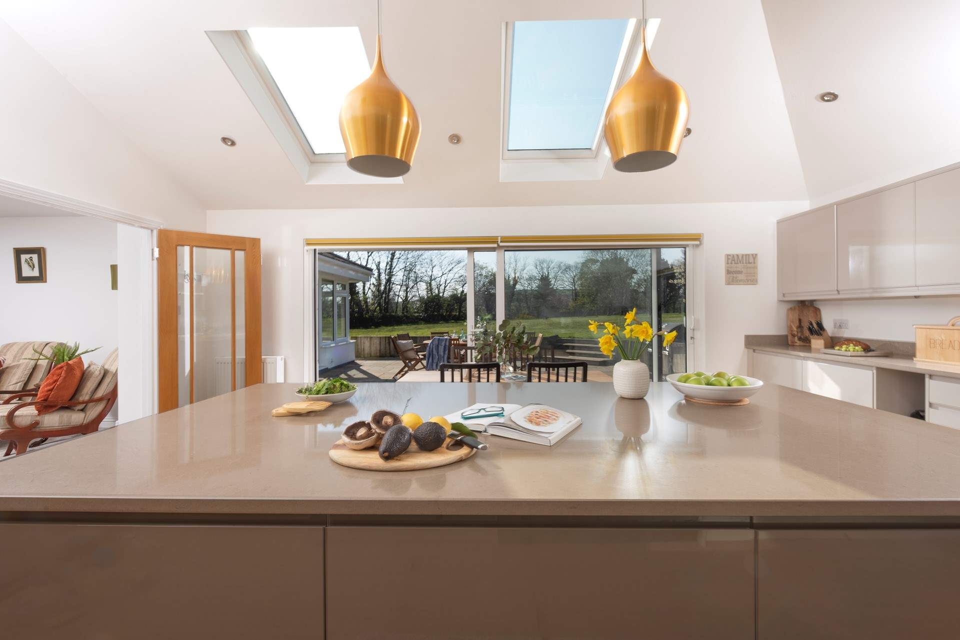 It will be a delight preparing meals around the huge kitchen island.