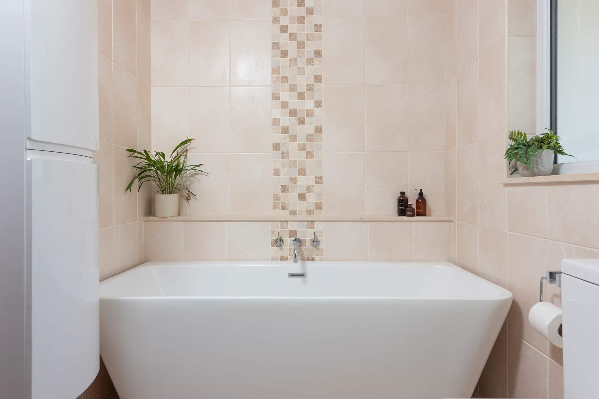 There's a free-standing bath in the family bathroom ideal for a leisurely holiday soak. 