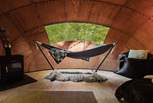 The hammock is a dreamy spot to unwind and admire the scenery.