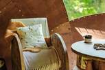 Handcrafted seating adds a touch of magic to the interior. 