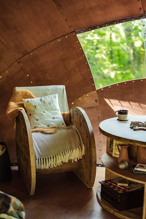 Handcrafted seating adds a touch of magic to the interior.