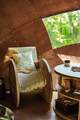 Handcrafted seating adds a touch of magic to the interior.
