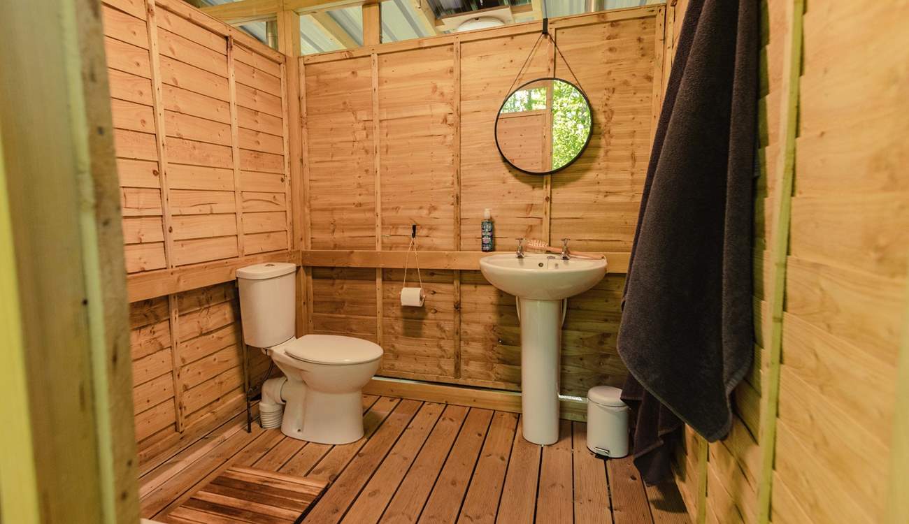 Complete with a personal shower room, WC, and sink.