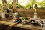 Dine together while enjoying nature's embrace.