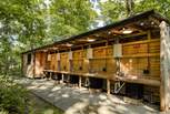 Sun-Dapple has its own kitchen with a sink, running water and fridge in the main cabin.