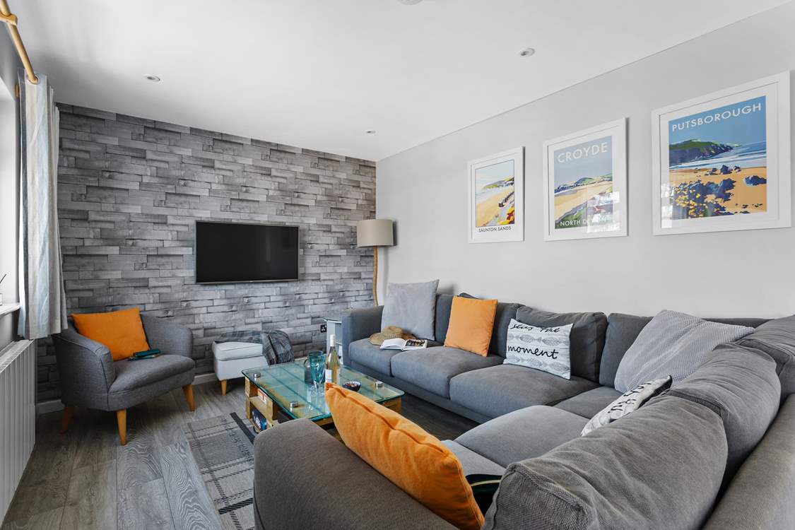 Sit back and relax into a film night after a day of sandcastle building and surfing the day away.