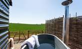 Soak away your worries in the steamy wood-fired hot tub.  - Thumbnail Image