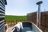 Soak away your worries in the steamy wood-fired hot tub. 
