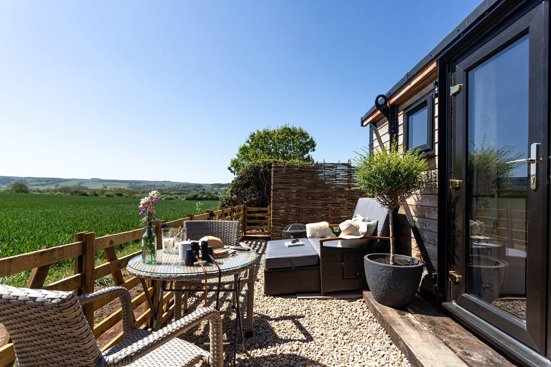 The outside space is a complete suntrap, perfectly designed for romantic getaways. 