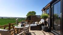 The outside space is a complete suntrap, perfectly designed for romantic getaways. 