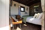 The double bed promises a restful night's sleep. 