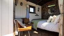 The double bed promises a restful night's sleep. 