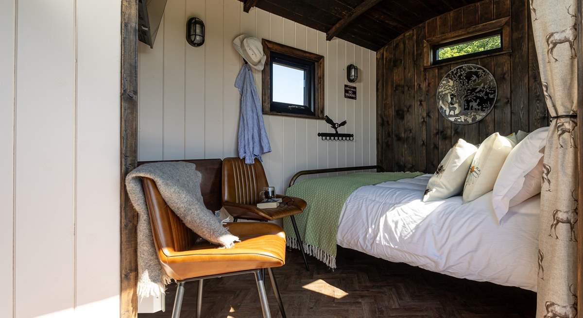 The double bed promises a restful night's sleep. 