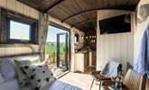 A mix of rustic and fresh interiors fill the space.  - Thumbnail Image