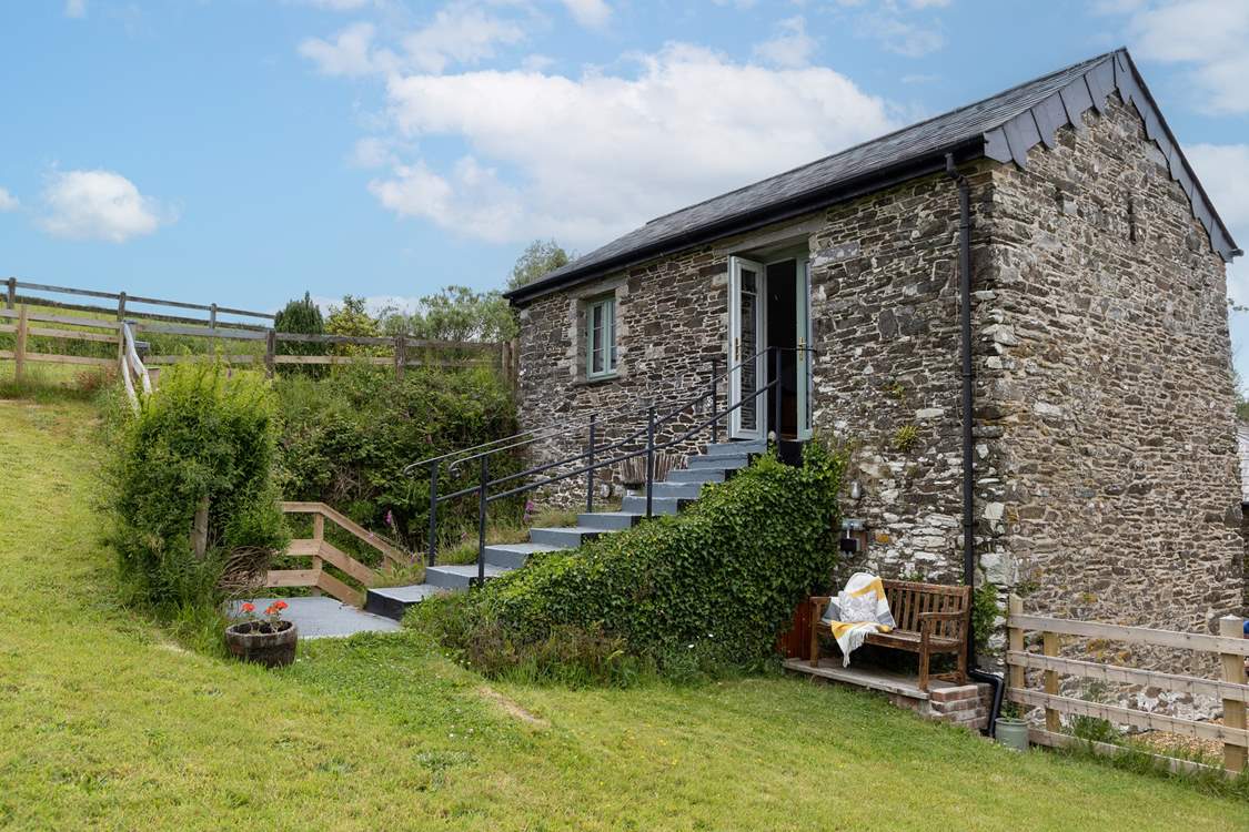 Steps lead from the first floor down to your private garden at the back of The Barn.