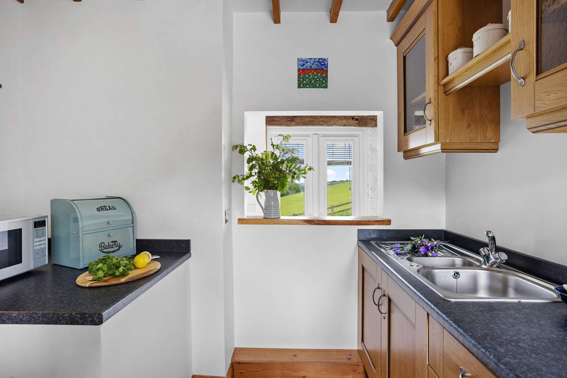 The living accommodation is on the first floor to make the most of the setting.
