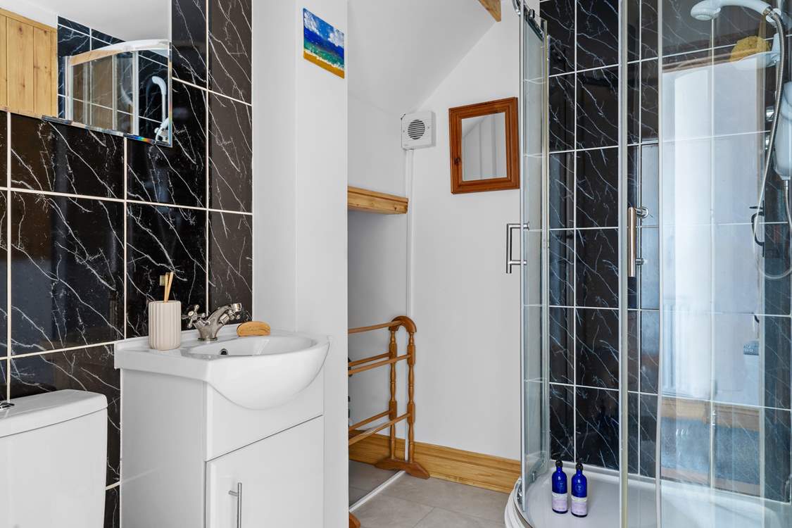 The shower-room can be found on the ground floor, next to the bedroom.
