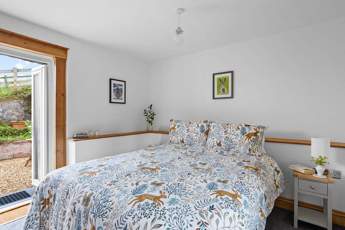 The bedroom is found on the ground floor.