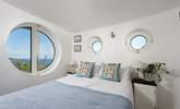 Porthole windows brings the boat shaped architecture together (bespoke coverings for night time are in situ). - Thumbnail Image