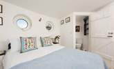 Bedroom 2 has a double bed with a private WC and wash-basin. - Thumbnail Image
