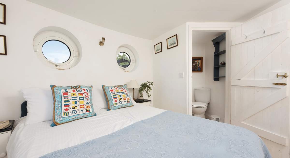 Bedroom 2 has a double bed with a private WC and wash-basin.