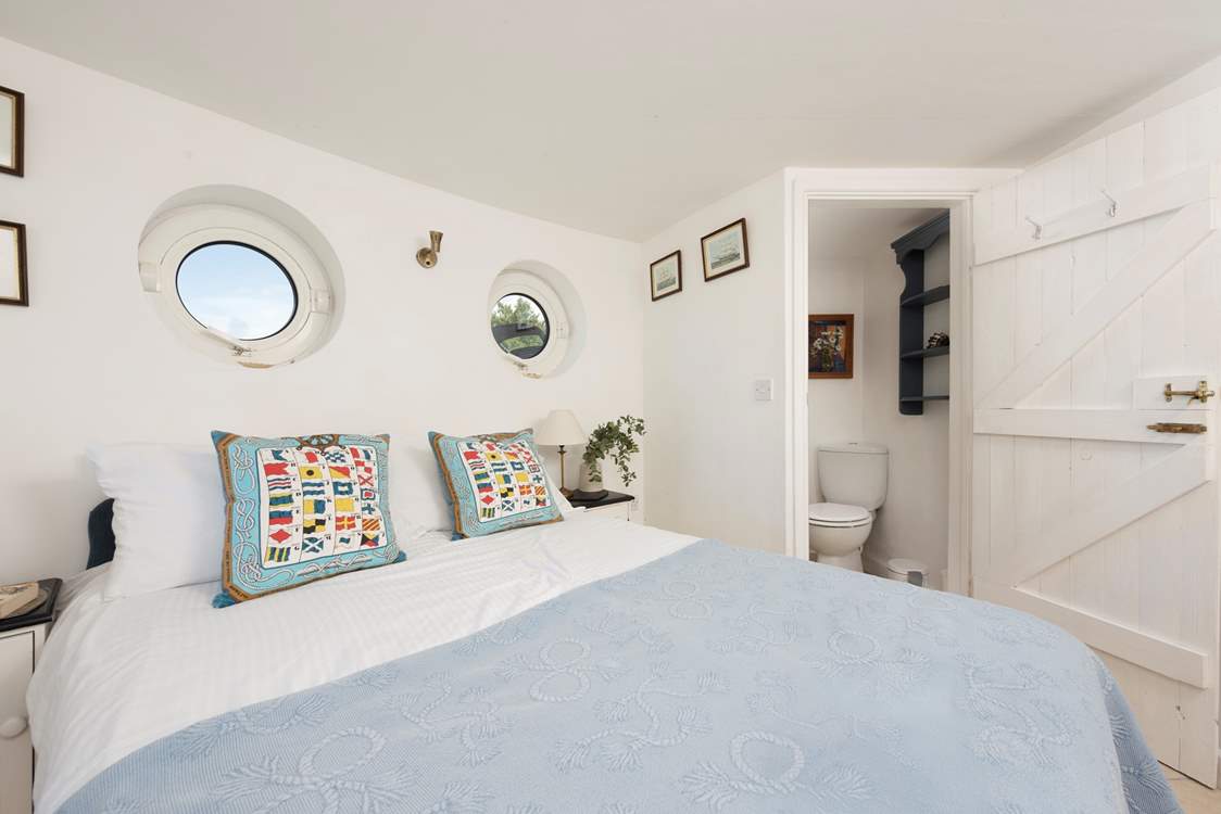 Bedroom 2 has a double bed with a private WC and wash-basin.