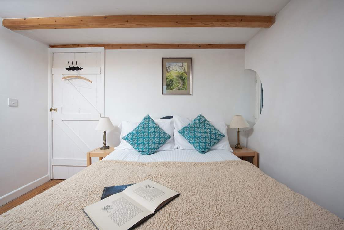Bedroom 1 has a comfortable double bed. A travel cot or Moses basket will fit snuggly here.