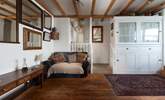 Cosy up after a day exploring. Take care on the steps up to bedroom 1 and the shower-room. - Thumbnail Image