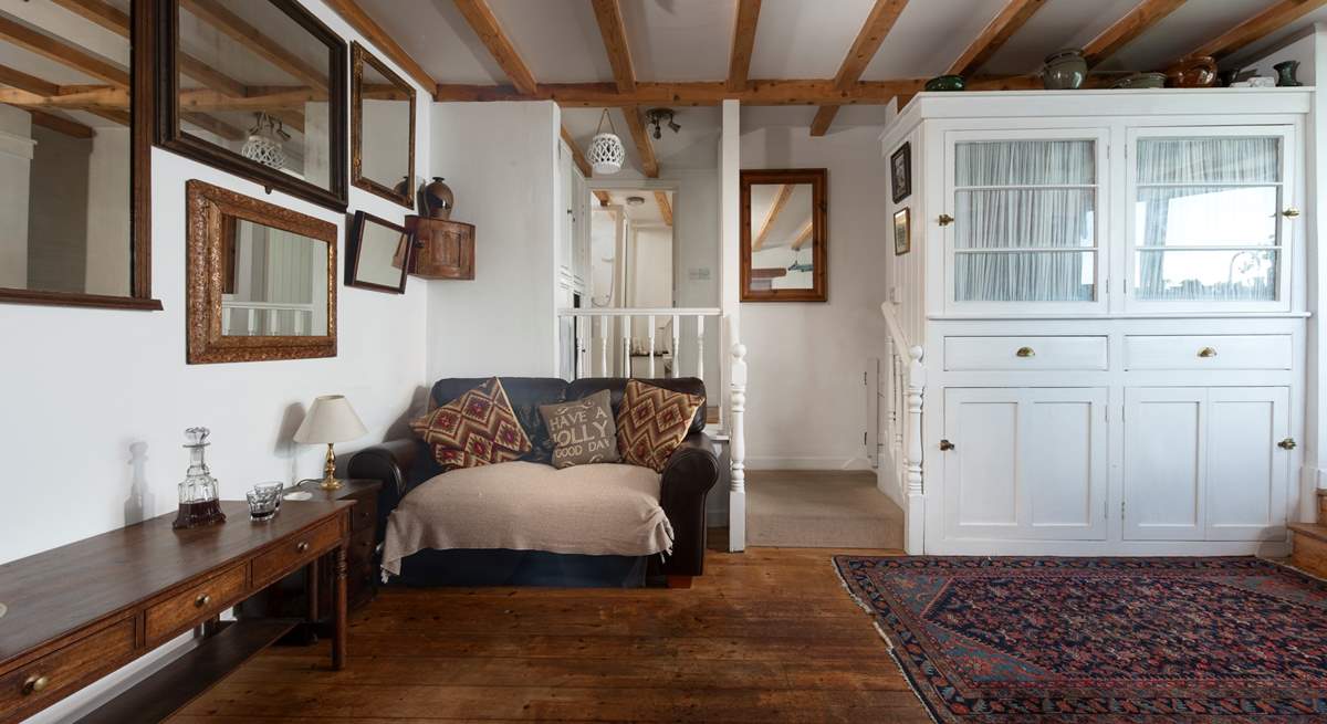 Cosy up after a day exploring. Take care on the steps up to bedroom 1 and the shower-room.