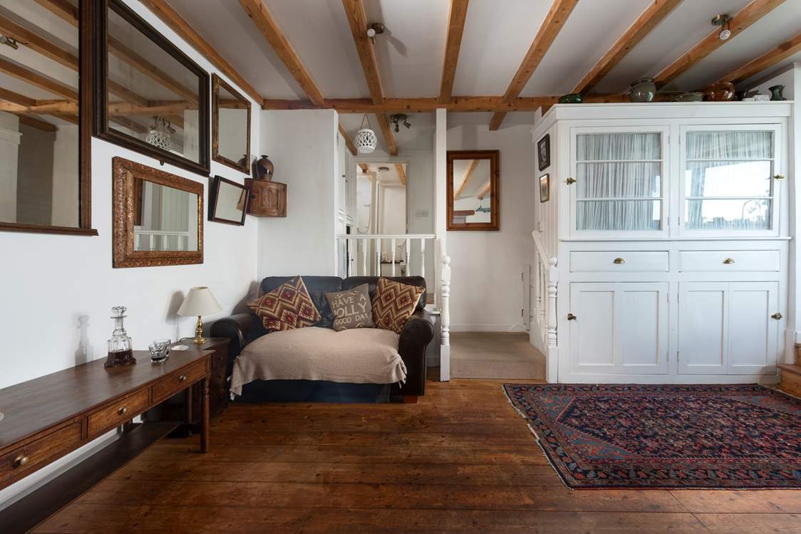 Cosy up after a day exploring. Take care on the steps up to bedroom 1 and the shower-room.