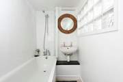 The en suite bathroom to bedroom 3.