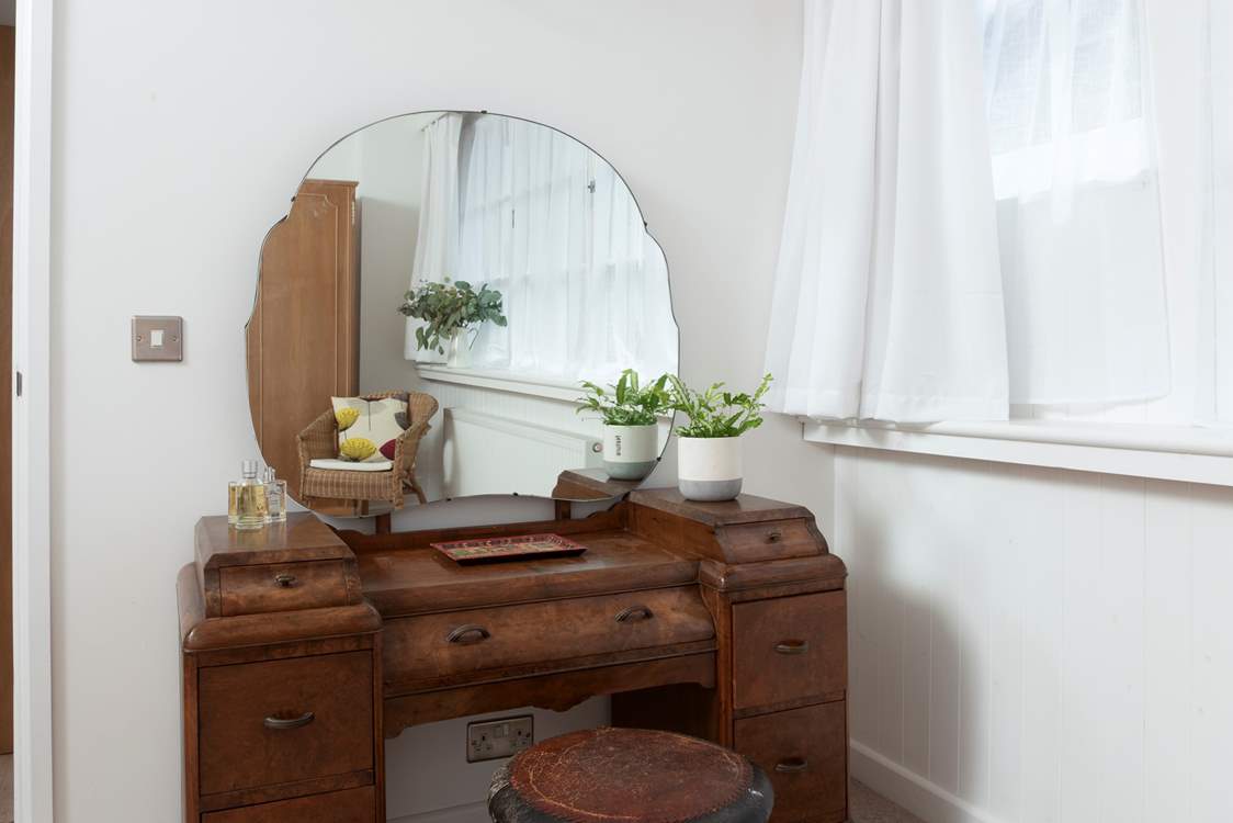 The home is full of vintage furniture from the owner's travels, which add character throughout.