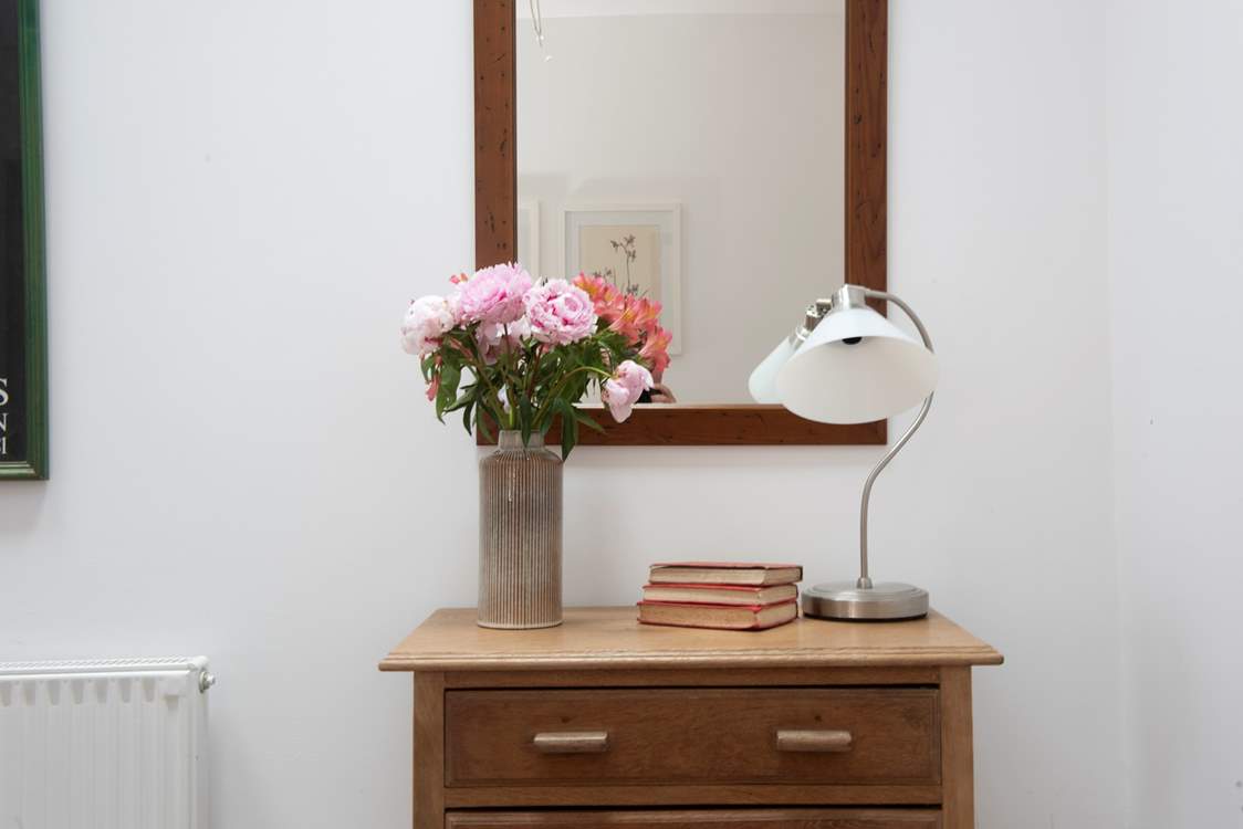 Delightful choice pieces of furniture add to the creative feel of the home.