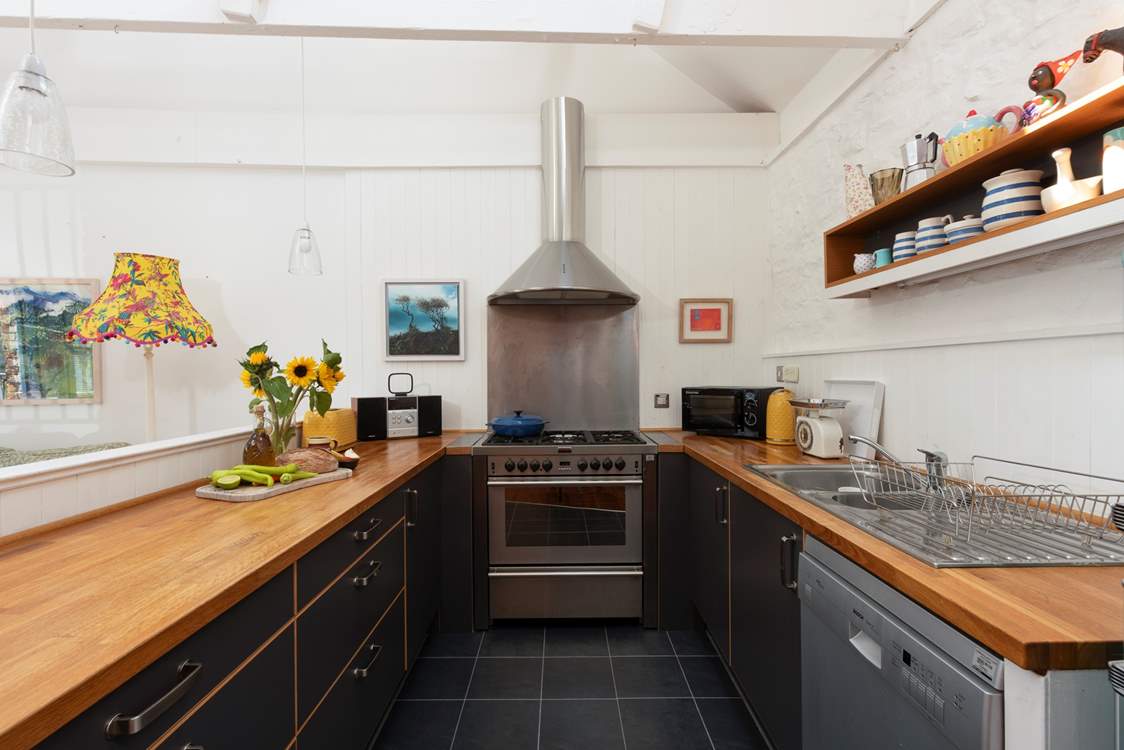 A modern kitchen with huge range, perfect for any aspiring chef.