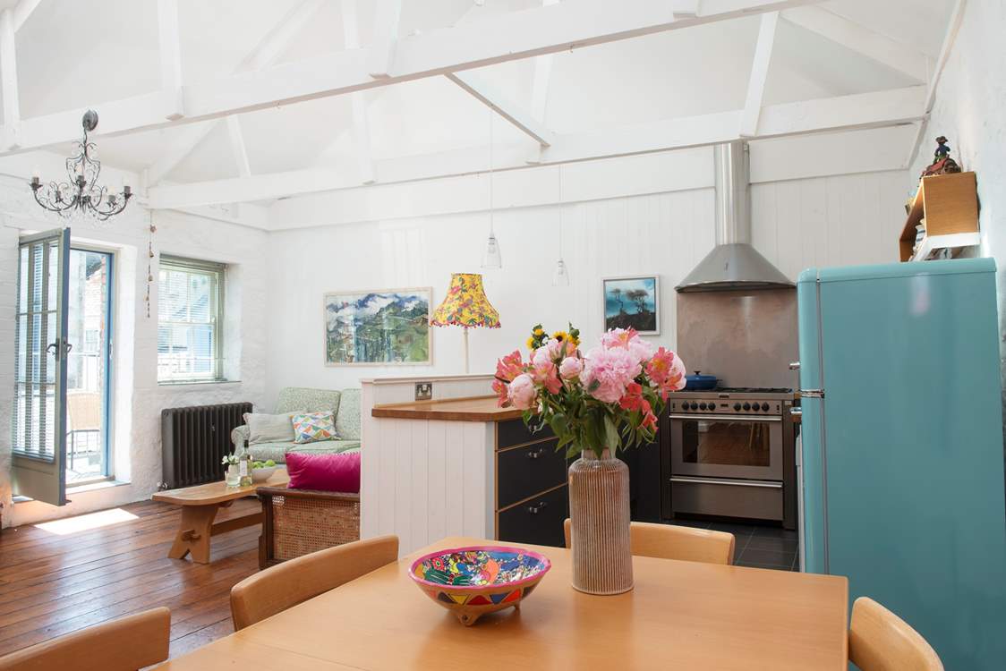 High ceilings and lots of natural light enhance the space in this beautiful property.