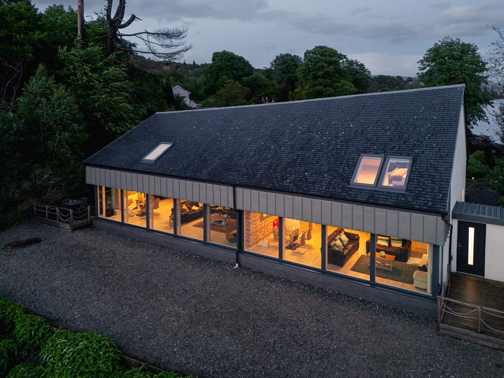 You can see the two living-rooms lit up at night.