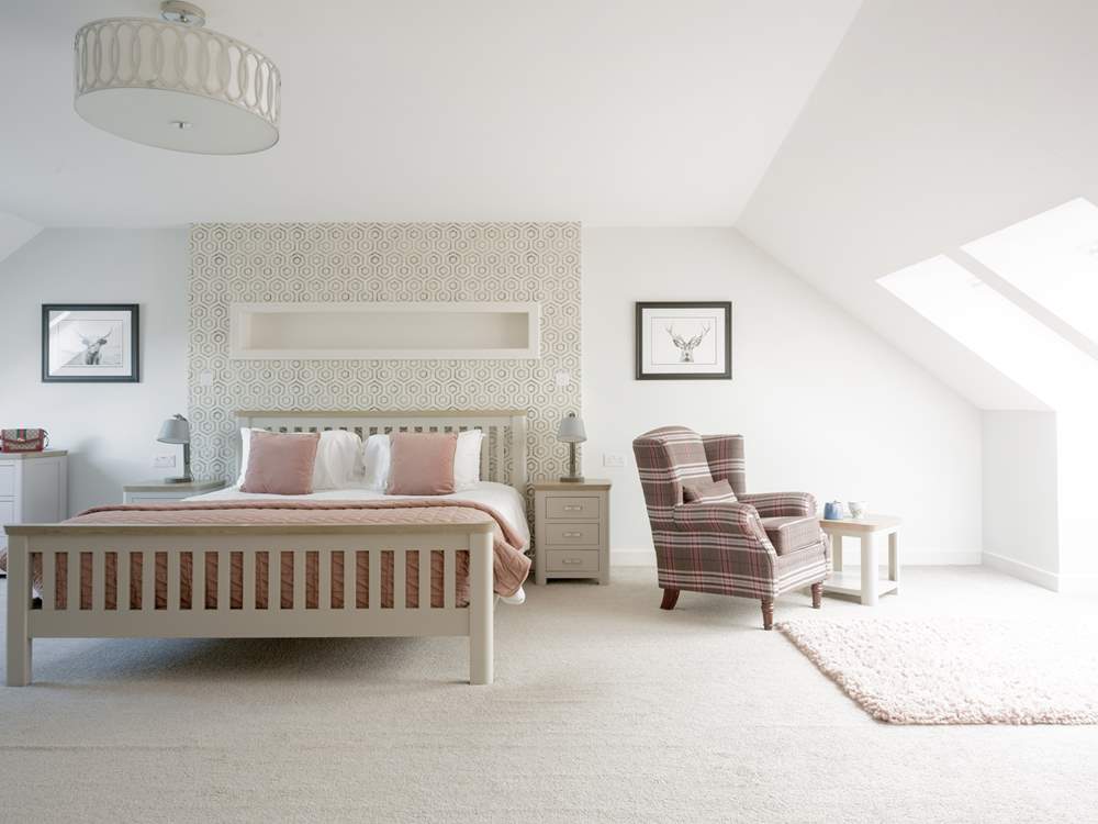 Bedroom 2 is large and relaxing, just the place to sit and take some time for yourself, watch the large Smart TV in comfort.