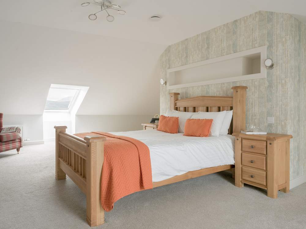 Bedroom 3 has lots of space, a Smart TV, en suite shower-room and fantastic views.