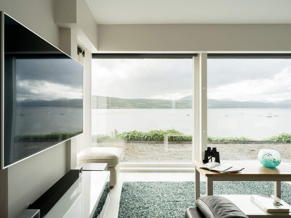 Watch the weather change throughout the day and maybe spot a submarine sailing past.