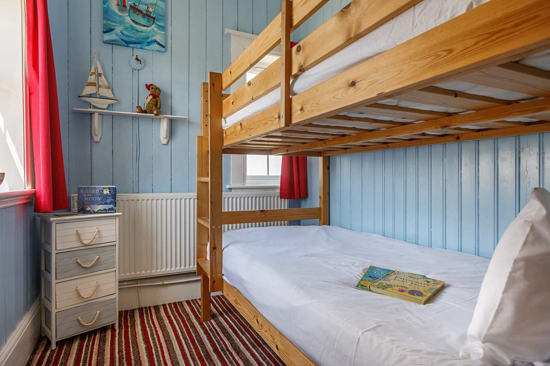 Full-size bunks for the kids or fun-loving adults with double-aspect sea views.