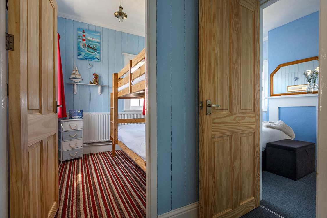 The double and bunk room sit next to each other on the first floor (access to the bathroom from the bunk room is through the double room).
