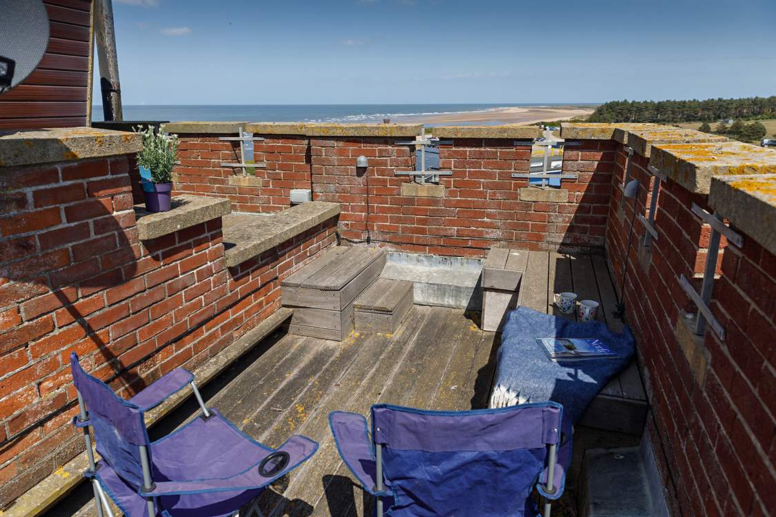 A sheltered rooftop garden, mind the steps.