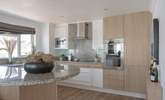 Enjoy the views whilst cooking up a family feast in the fully equipped kitchen. - Thumbnail Image
