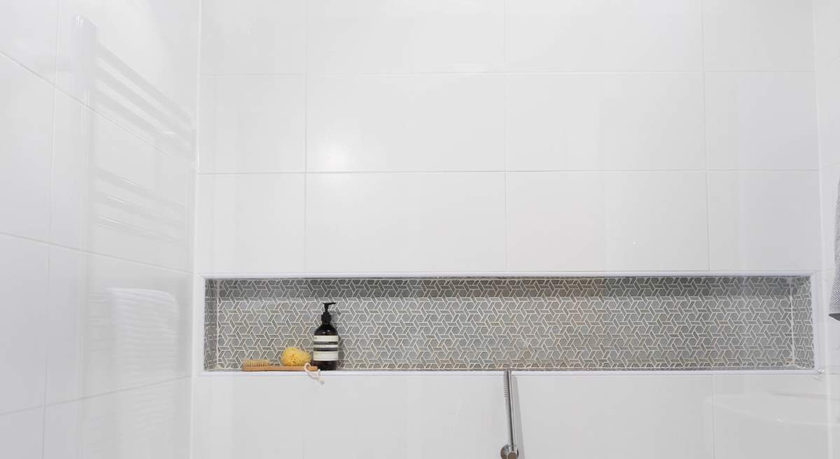 Next door is the family shower-room.