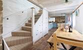 The stairs lead to the bedrooms and family shower-room.  - Thumbnail Image