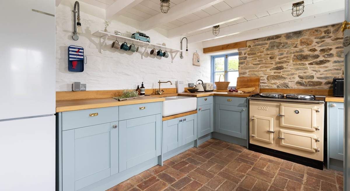 The cottage kitchen has an electric Esse for all your cooking needs. 