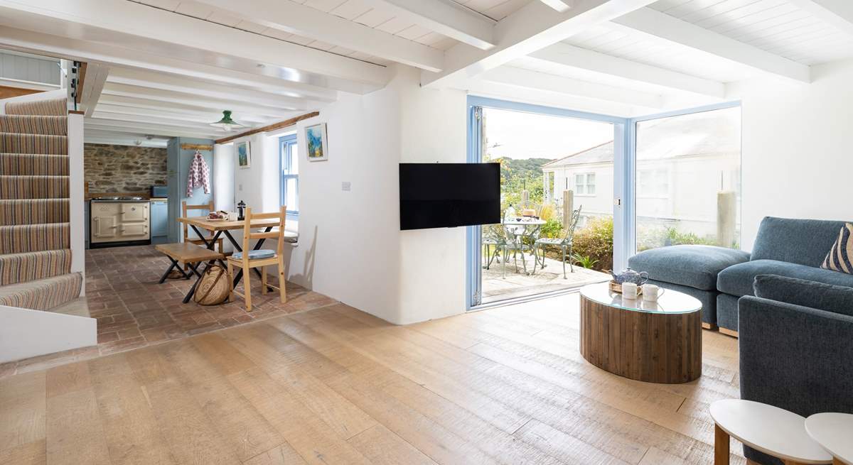 Enjoy opening the bi-fold doors and the summer breeze floating in. 